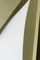abstract background with olive green paper shapes and triangular white space