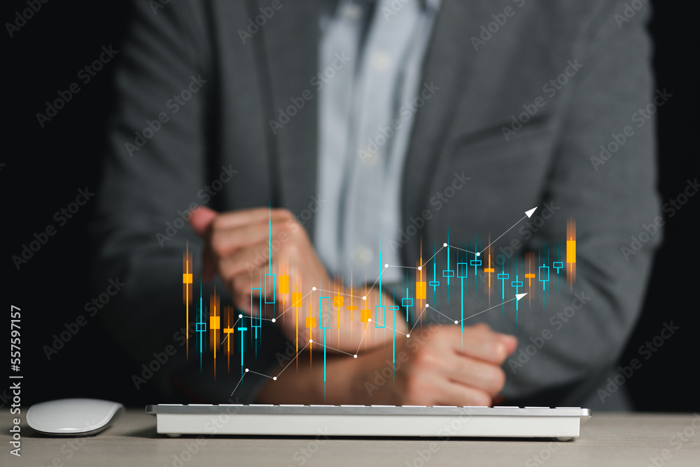 Wall mural Businessman analyzing forex trading graph financial data. Business finance background. business finance technology and investment concept. Stock Market Investments Funds and Digital Assets. 