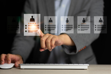 Human Resources uses computers to search and select job applicantsThe process of selecting people to join the work of the HR. Human Resources HR management Recruitment Employment Headhunting Concept.