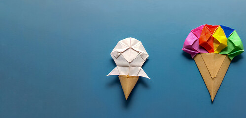 Generative AI. Colorful ice cream origami paper crafts on blue background. copy space background for your text or message.