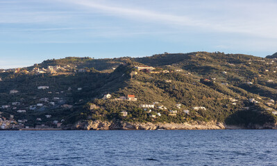 Rocky Coast and Homes near Touristic Town, Sorrento, Italy. Amalfi Coast. Sunny Evening