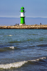 Obraz premium lighthouse at the entrance to Warnemünde harbor