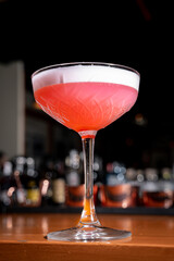 delicious and refined cocktail in a bar counter