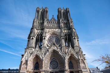Fototapeta na wymiar View in details on gothic Roman Catholic cathedral church Notre-Dame in central part of old French city Reims, France