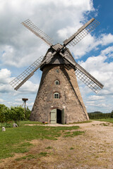 Plakat Old windmill in village of Araisi, Latvia, Europe
