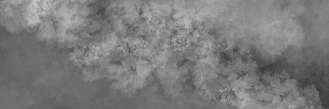 Black and white background with smoke texture or textured marbled watercolor painted sky concept in shades of gray, cloudy wisps or stormy clouds banner design