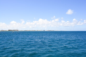 Obraz premium A view on Aruba coast from offshore Caribbean sea. Space for copy. 