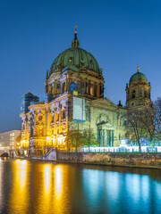 Berlin Cathedral and lights reflection on Spree canal at night