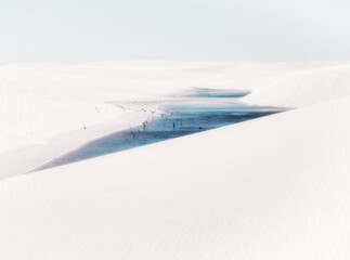 rainwater pond among the white sand dunes of Lencois Maranhenses