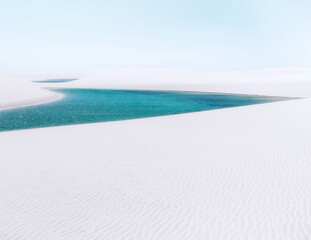 rainwater pond among the white sand dunes of Lencois Maranhenses