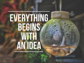 Everything begins with an idea. Text with vintage background. Inspirational motivational quote. - obrazy, fototapety, plakaty