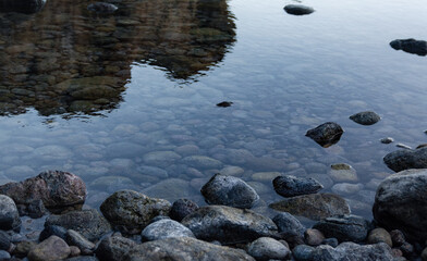 Texture of some stones submerged in a natural pool of volcanic rocks in Tenerife, Canary Islands