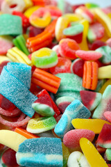 Tasty colorful jelly candies as background, closeup