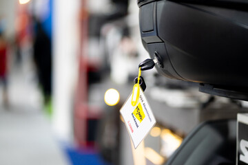The black key of the motorcycle topcase, the backrest of the motorcycle