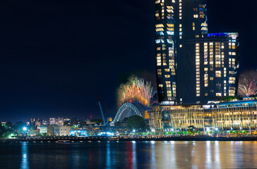 Sydney Harbour Bridge New Years Eve fireworks, colourful NYE fire works lighting the night skies with vivid multi colours NSW Australia. Happy New Year. New Year Eve