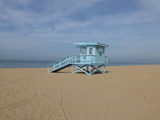 Obraz premium Light blue lifeguard tower on Jomtien beach Pattaya, Thailand. Colorful summer on the beach.