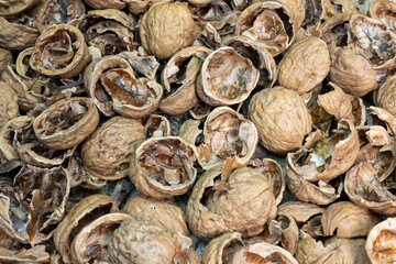 close up of empty walnut shells, top view