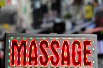 A massage parlor sign is seen in the touristic Bui Vien street in Ho Chi Minh City, Saigon District 1, Vietnam.
