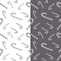 Seamless pattern monochrome colors with candy canes ornament. Perfect for wrapping paper, fabric, or wallpaper. Vector illustration.