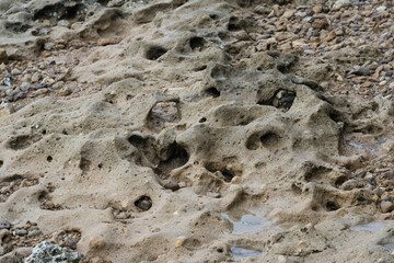 Smooth round pebbles on the beach in Bangkalan, Madura, Indonesia.