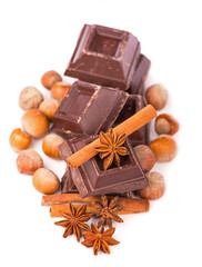 chocolate bars with its ingredients isolated on white background