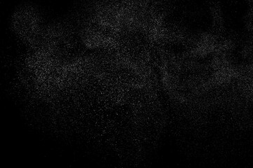 Obraz premium Distressed white grainy texture. Dust overlay textured. Grain noise particles. Rusted black background. Vector illustration. EPS 10. 