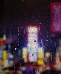 Raindrops on window glass. Selective focus
