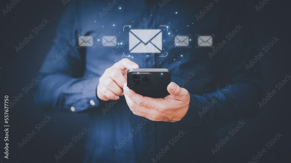 Poster email marketing and newsletters, technology and lifestyle concepts. man's hand using smartphone or m