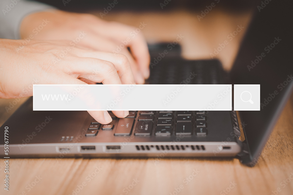 Poster Businessman's hand working with computer laptop on desk in home. Searching Browsing Internet Data Information with blank search bar. Search Engine Optimization SEO Networking Concept.