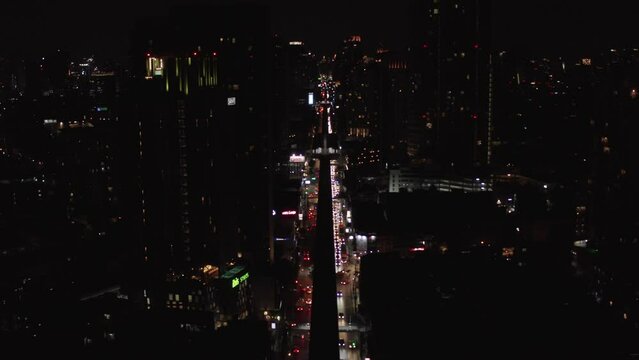 Night scene of traffic on Sukhumvit in Bangkok, the capital of Thailand. City landscape. Business city. Business travel. Colorful sunset. city skyline 4K. Cityscape skyline. Aerial view of skyline of