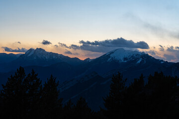 sunrise over the snowy mountains