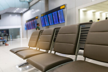 seats awaiting the flight, waiting for the airline, and traveling internationally