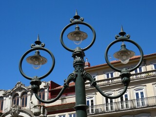 Fototapeta na wymiar Historic street lantern in Porto near the Sao bento Station - Portugal 