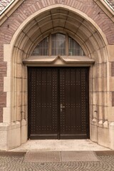 Fototapeta na wymiar wooden door entrance to the church