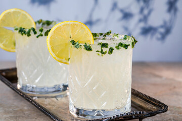 Sparkling basil infused vodka and lemonade cocktail