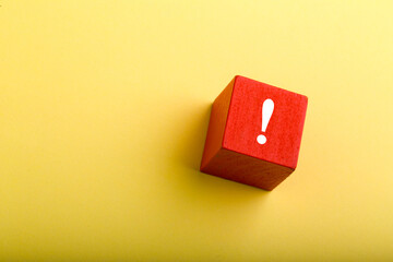 Red Block With Exclamation Mark isolated On Yellow