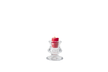 Glass candlestick and red burning candle isolate on white. PNG
