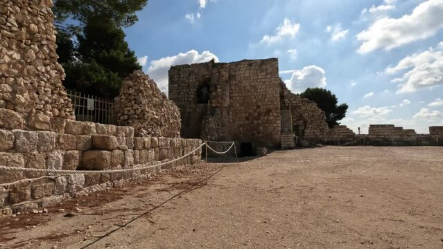 Archaeological site of ruins of an ancient fortress, in Tel Apek National Park. In central Israel - cloudy summer sky