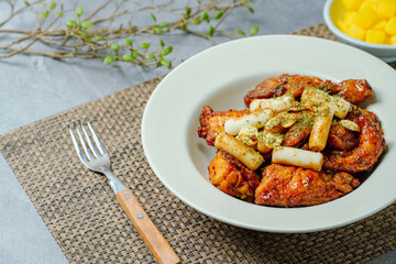 yangnyeom chicken, Korean Seasoned Fried Chicken : This dish is seasoned chicken cut into pieces, deep- fried, and mixed with soy sauce, gochujang, or other sauces. It has a mild yet spicy taste that 