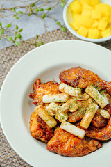 yangnyeom chicken, Korean Seasoned Fried Chicken : This dish is seasoned chicken cut into pieces, deep- fried, and mixed with soy sauce, gochujang, or other sauces. It has a mild yet spicy taste that 