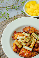 yangnyeom chicken, Korean Seasoned Fried Chicken : This dish is seasoned chicken cut into pieces, deep- fried, and mixed with soy sauce, gochujang, or other sauces. It has a mild yet spicy taste that 