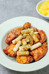 yangnyeom chicken, Korean Seasoned Fried Chicken : This dish is seasoned chicken cut into pieces, deep- fried, and mixed with soy sauce, gochujang, or other sauces. It has a mild yet spicy taste that 