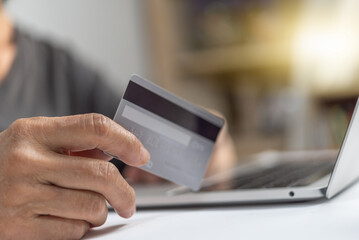 Woman using credit card for Online shopping, internet banking, store online, payment, spending money, e-commerce payment concept.
