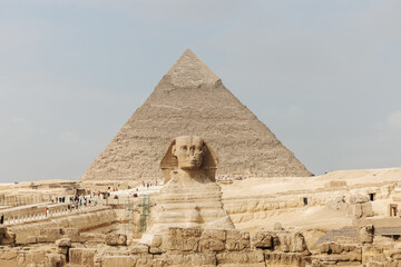 Great Sphinx of Giza in front of the Cheops pyramid