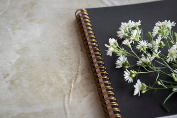 notebook and flowers