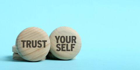 Motivational and inspirational quote wrote on wood. Trust yoursef