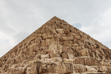 Fototapeta premium Small Pyramid at the eastern cemetery in front of the Pyramids of Giza