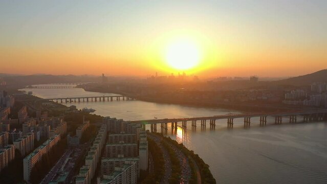 [korea drone footage] Seoul cityscape, Han River, Seongsu Bridge, sunset