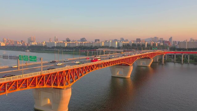 [korea drone footage] Seoul cityscape, Han River, Seongsu Bridge, sunset