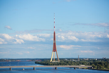 Fototapeta na wymiar Riga national TV tower next to river Daugava - Riga, Latvia